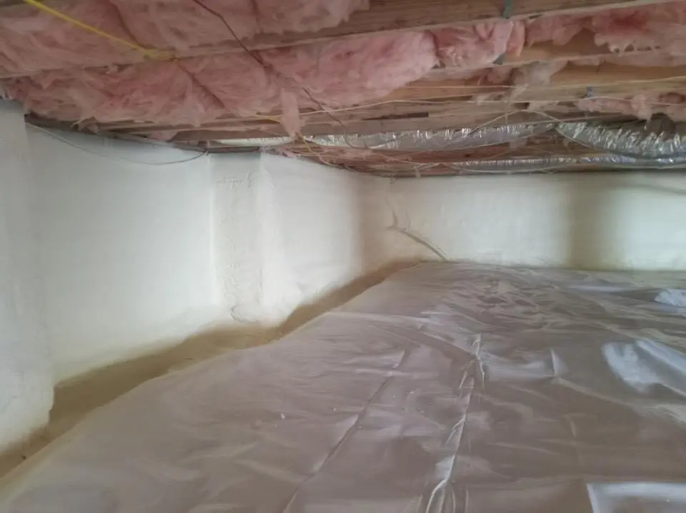 Crawl space encapsulation with closed-cell spray foam for Commercial Roof Restoration in Birmingham